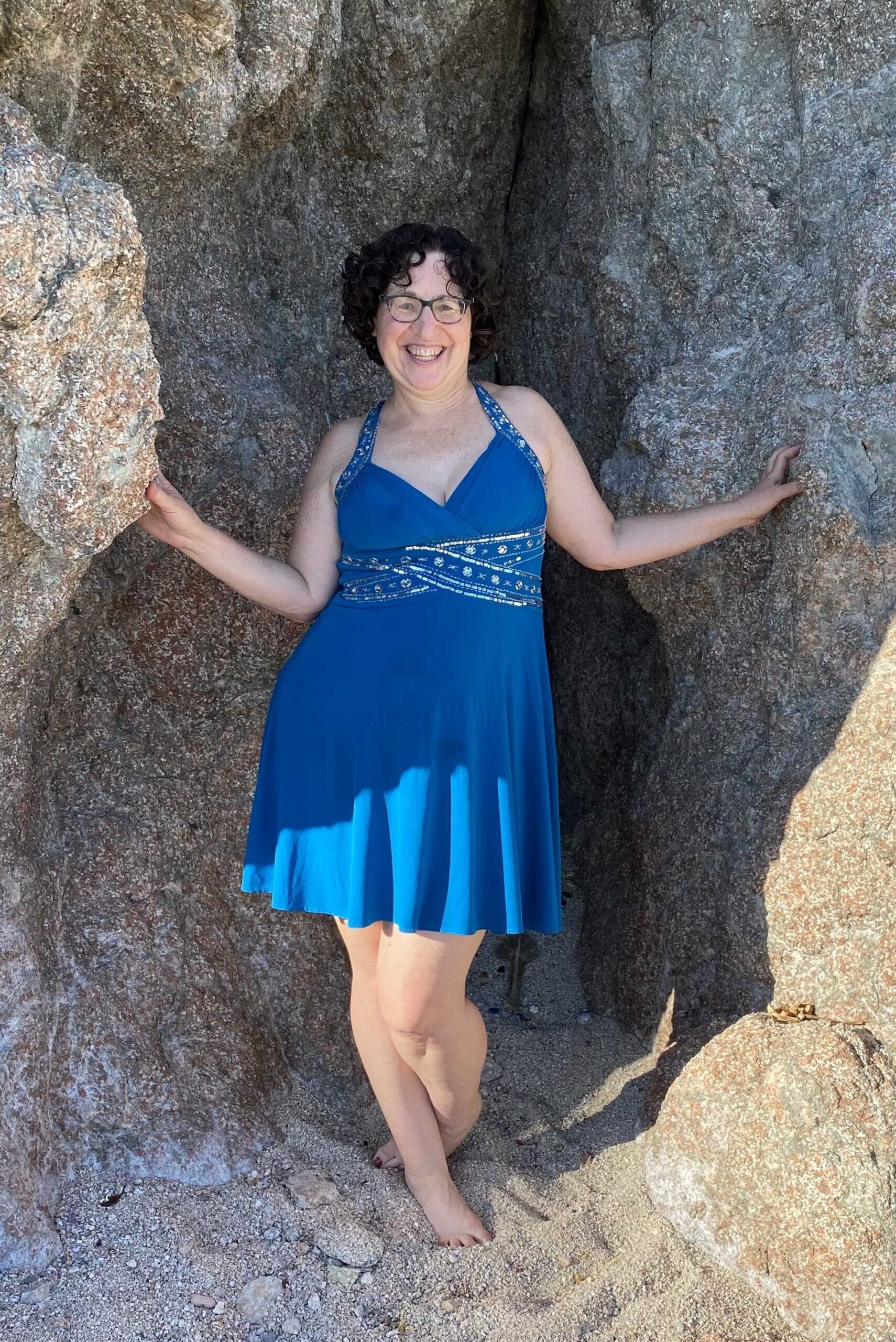 Juliana outdoors in a turquoise dress